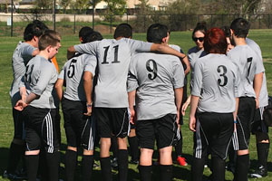 Soccer players during break from game.